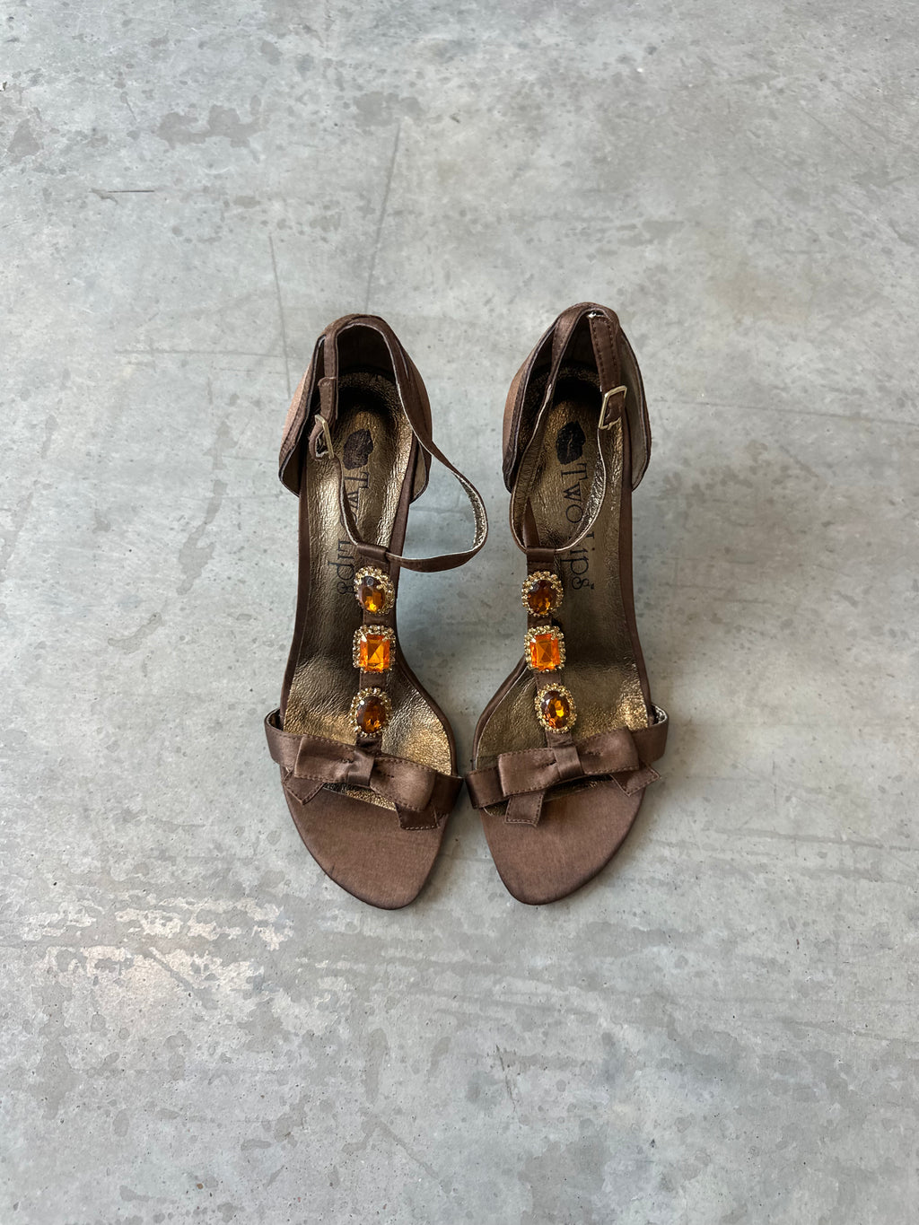 two lips brown and gold embellished heels