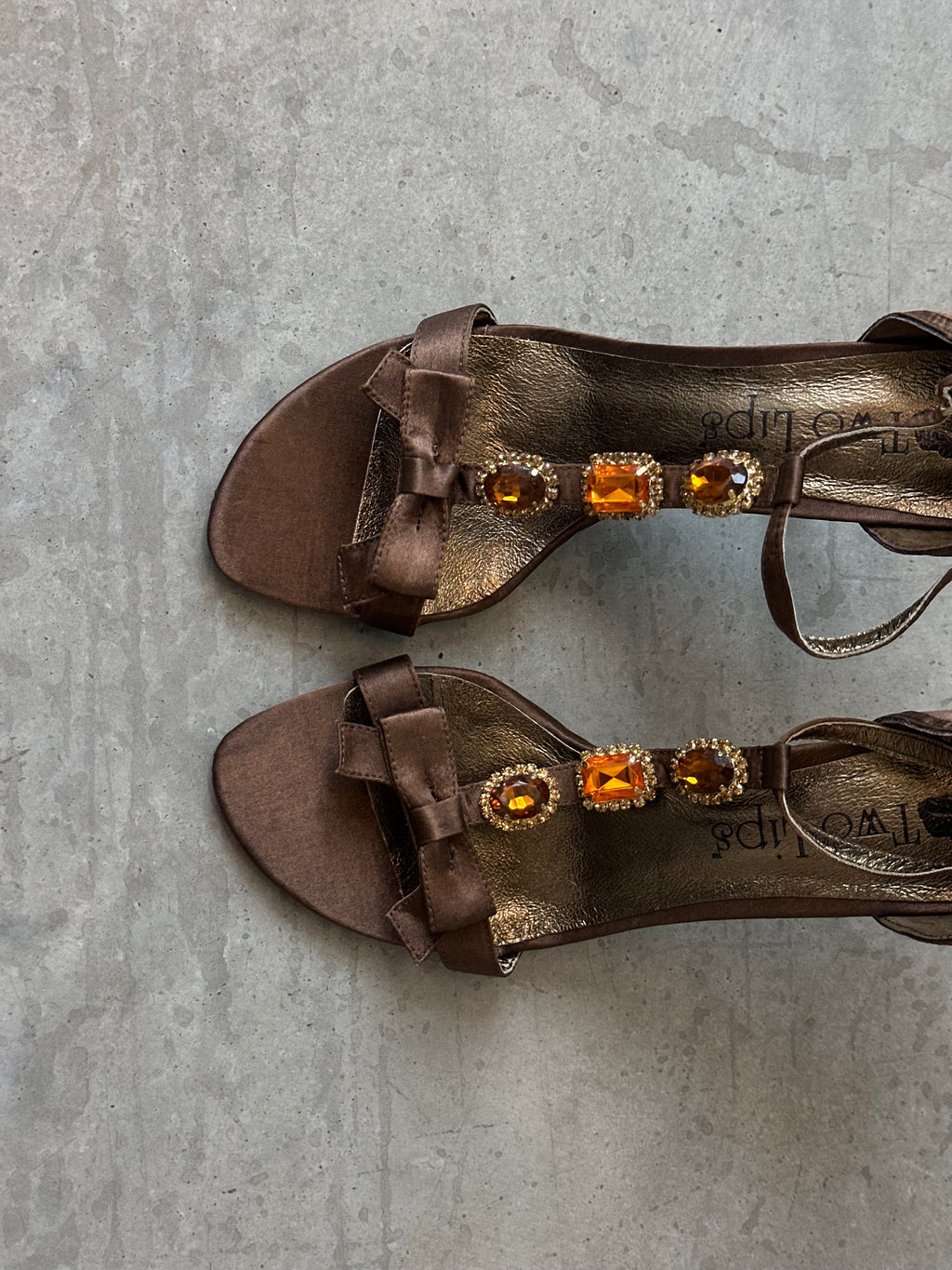 two lips brown and gold embellished heels